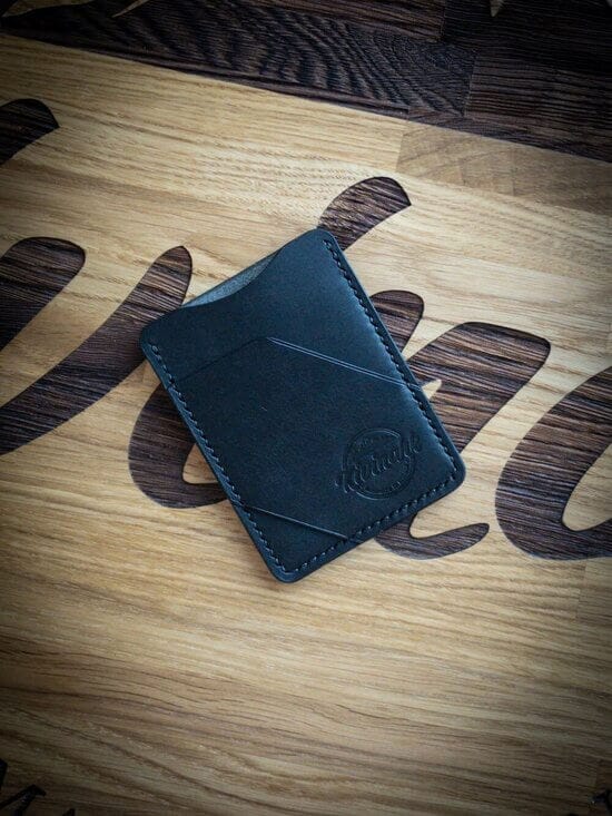 Handmade minimalist black vegetable tanned leather cardholder