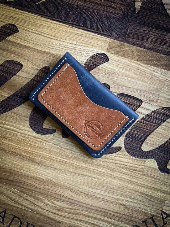handmade blue and almond brown vegetable tanned leather card wallet with a flap closure